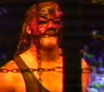 Kane enters the Elimination Chamber